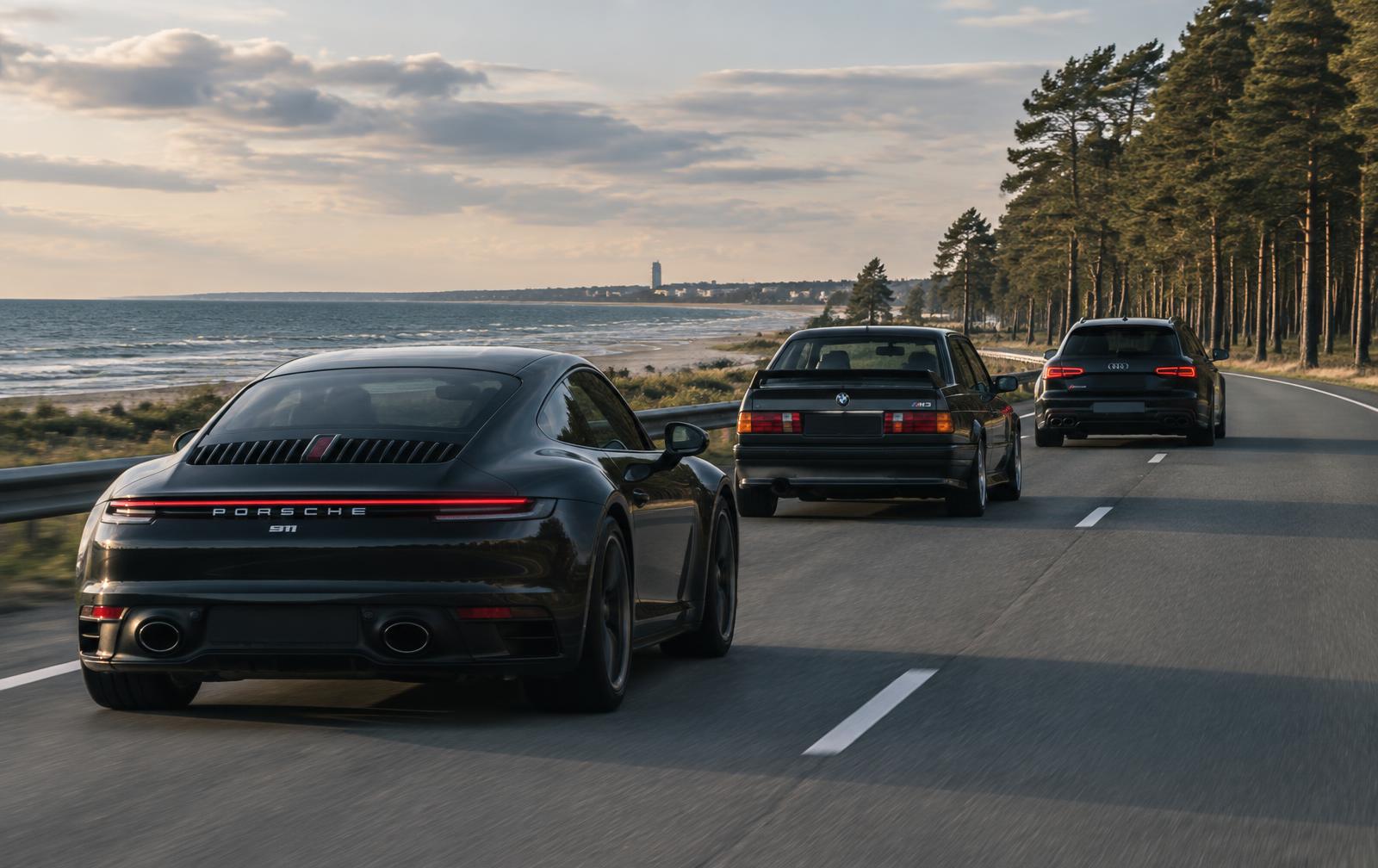 Convoy of sports cars driving along the Baltic coast